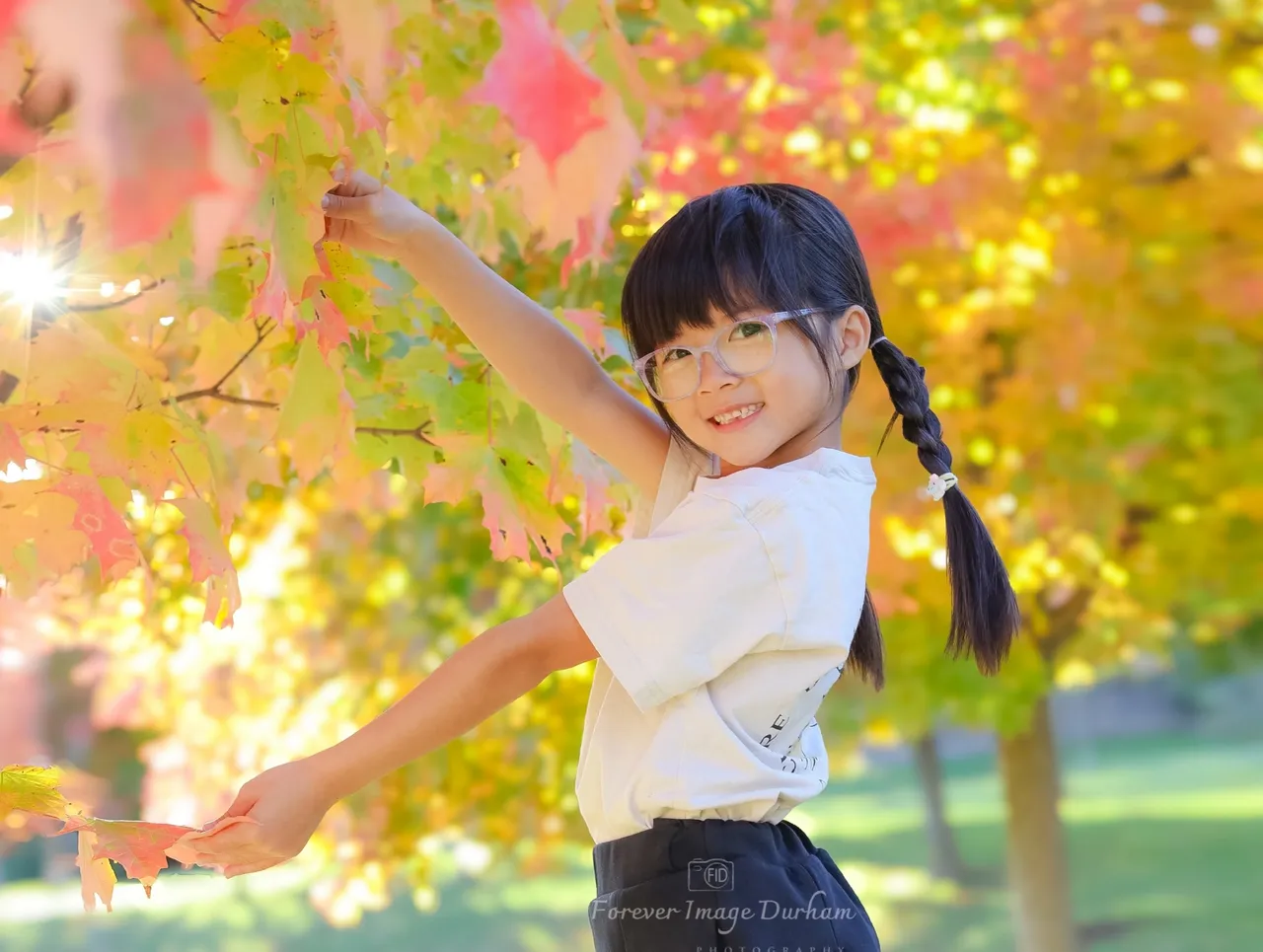 Child enjoying a sunny fall day