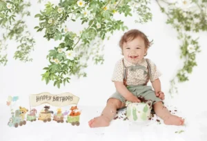 Smiling child with birthday cake mess
