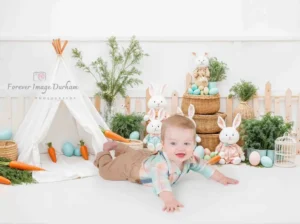 Infant surrounded by Easter decorations