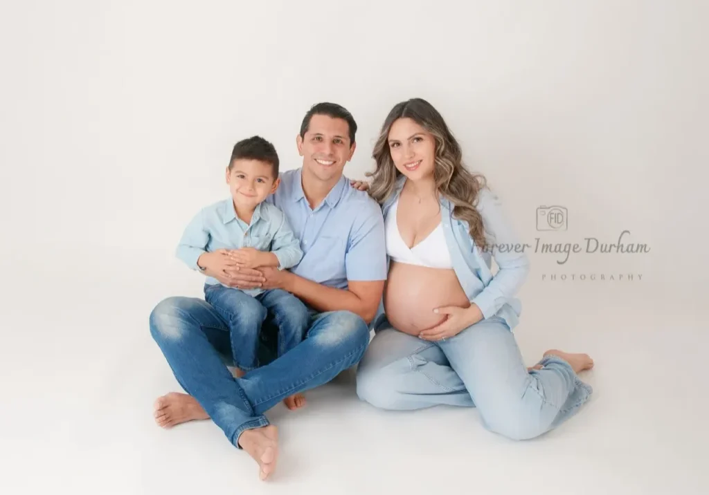 Parents and son in studio setting