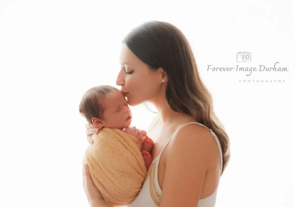 Tender moment with baby and mother
